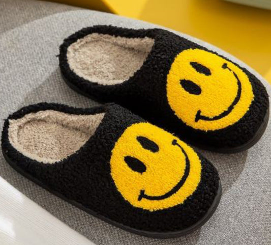 Black smiley face slippers